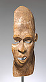 Ikem helmet mask fragment, Southern Igbo, Ibibio, or Anaang artist, Wood, pigment, plant fiber remnants, Ibibio or Igbo peoples, Ozu Item group (?)