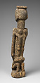 Kneeling female figure with twin children and serpent, Tellem or Dogon blacksmith, Wood, applied organic materials, Dogon or Tellem  peoples (?)
