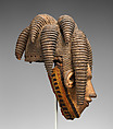 Agbogho mmuo (maiden spirit) face mask, Igbo artist, Wood, pigment, cloth, wire, thread, applied organic material, Igbo peoples