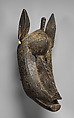 Suruku koun (hyena) mask, Bamana numuw (blacksmith), Wood, cowrie shells, pigment, Bamana peoples