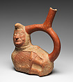 Stirrup spout bottle with peanut figure, Moche artist(s), Ceramic, slip, Moche