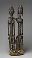 Seated couple, "Barnes Foundation Master" (active late 18th–early 19th century[?], Bandiagara Escarpment, Mali), Wood, copper and iron alloy, applied organic materials, Dogon