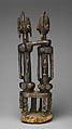 Seated couple, "Barnes Foundation Master" (active late 18th–early 19th century[?], Bandiagara Escarpment, Mali), Wood, copper and iron alloy, applied organic materials, Dogon