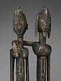 Seated couple, "Barnes Foundation Master" (active late 18th–early 19th century[?], Bandiagara Escarpment, Mali), Wood, copper and iron alloy, applied organic materials, Dogon