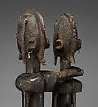 Seated couple, "Barnes Foundation Master" (active late 18th–early 19th century[?], Bandiagara Escarpment, Mali), Wood, copper and iron alloy, applied organic materials, Dogon