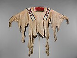 Man's Shirt, Native-tanned skin, factory-woven cloth, porcupine quill, glass beads, horsehair, wool yarn, ermine, Crow