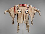 Man's Shirt, Native-tanned skin, factory-woven cloth, porcupine quill, glass beads, horsehair, wool yarn, ermine, Crow