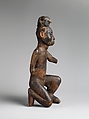 Power Figure (Nkisi): Kneeling Male, Kongo artist, Wood, cloth traces, applied organic matter, bone, resin, Kongo peoples