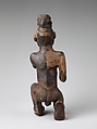 Power Figure (Nkisi): Kneeling Male, Kongo artist, Wood, cloth traces, applied organic matter, bone, resin, Kongo peoples