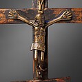 Triple Crucifix, Kongo artist, Open-back cast brass (central figure), solid cast brass (top and bottom figures), forged iron nails, brass, copper, wood, ultramarine pigment, Kongo