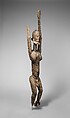 Priest with raised arms, Dogon blacksmith, Wood, applied organic materials, Dogon