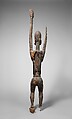 Priest with raised arms, Dogon blacksmith, Wood, applied organic materials, Dogon