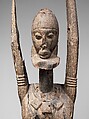 Priest with raised arms, Dogon blacksmith, Wood, applied organic materials, Dogon