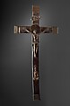 Crucifix, Solid cast brass (Christ), solid cast copper alloy (halo); hollow cast bronze (three end pieces), brass sheet (one end piece), solid cast copper alloy (Mary); forged copper and brass (nails), wood, Kongo peoples; Kongo Kingdom