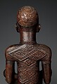 Figure: Seated Female Supporting Figure Clasping Her Breast, Master of Kasadi, Wood, glass, kaolin, Kongo peoples; Yombe group