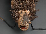 Power Figure (Nkisi N'Kondi: Kozo), Wood, iron, plant fiber, textile, glass, resin, feathers, leopard tooth, leather, pigment, Kongo peoples; Yombe group