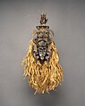 Kpeliye’e headdress, Senufo artist, Wood, horns, quills, raffia fiber, cotton cloth, feathers, metal, applied organic materials, Senufo