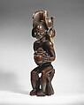 Mwanangana (lord of the land) playing a sanza, Chokwe artist, Wood (uapaca), cloth, plant fiber, beads, dye, resinous coating, Chokwe