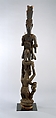Òpó (veranda post) with equestrian and female figure, Olowe of Ise (Nigerian, born Efon-Alaaye, ca. 1873–1938), Iroko wood, paint, resin