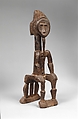 Seated male figure for a komien (trance diviner), Baule artist  Baoulé, Wood, beads, Baule peoples