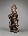 Nkisi (power figure) with dog and rider, Kongo artist and nganga (ritual specialist), Wood, resin, glass, pigment, Kongo peoples