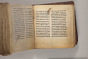 Arganonä Maryam (The Organ of Mary) prayer book, Attributed to Baselyos (The Ground Hornbill Master) (active late 17th century, Lasta region, Ethiopian), Parchment, pigment ink, wood, leather, fiber