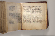 Arganonä Maryam (The Organ of Mary) prayer book, Attributed to Baselyos (The Ground Hornbill Master) (active late 17th century, Lasta region, Ethiopian), Parchment, pigment ink, wood, leather, fiber
