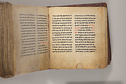 Arganonä Maryam (The Organ of Mary) prayer book, Attributed to Baselyos (The Ground Hornbill Master) (active late 17th century, Lasta region, Ethiopian), Parchment, pigment ink, wood, leather, fiber