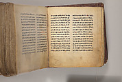 Arganonä Maryam (The Organ of Mary) prayer book, Attributed to Baselyos (The Ground Hornbill Master) (active late 17th century, Lasta region, Ethiopian), Parchment, pigment ink, wood, leather, fiber