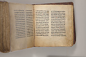 Arganonä Maryam (The Organ of Mary) prayer book, Attributed to Baselyos (The Ground Hornbill Master) (active late 17th century, Lasta region, Ethiopian), Parchment, pigment ink, wood, leather, fiber