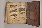 Arganonä Maryam (The Organ of Mary) prayer book, Attributed to Baselyos (The Ground Hornbill Master) (active late 17th century, Lasta region, Ethiopian), Parchment, pigment ink, wood, leather, fiber