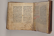 Arganonä Maryam (The Organ of Mary) prayer book, Attributed to Baselyos (The Ground Hornbill Master) (active late 17th century, Lasta region, Ethiopian), Parchment, pigment ink, wood, leather, fiber