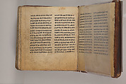 Arganonä Maryam (The Organ of Mary) prayer book, Attributed to Baselyos (The Ground Hornbill Master) (active late 17th century, Lasta region, Ethiopian), Parchment, pigment ink, wood, leather, fiber