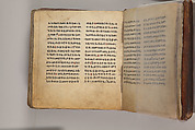 Arganonä Maryam (The Organ of Mary) prayer book, Attributed to Baselyos (The Ground Hornbill Master) (active late 17th century, Lasta region, Ethiopian), Parchment, pigment ink, wood, leather, fiber