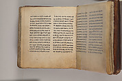 Arganonä Maryam (The Organ of Mary) prayer book, Attributed to Baselyos (The Ground Hornbill Master) (active late 17th century, Lasta region, Ethiopian), Parchment, pigment ink, wood, leather, fiber