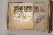 Arganonä Maryam (The Organ of Mary) prayer book, Attributed to Baselyos (The Ground Hornbill Master) (active late 17th century, Lasta region, Ethiopian), Parchment, pigment ink, wood, leather, fiber