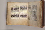 Arganonä Maryam (The Organ of Mary) prayer book, Attributed to Baselyos (The Ground Hornbill Master) (active late 17th century, Lasta region, Ethiopian), Parchment, pigment ink, wood, leather, fiber