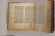 Arganonä Maryam (The Organ of Mary) prayer book, Attributed to Baselyos (The Ground Hornbill Master) (active late 17th century, Lasta region, Ethiopian), Parchment, pigment ink, wood, leather, fiber