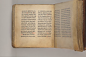 Arganonä Maryam (The Organ of Mary) prayer book, Attributed to Baselyos (The Ground Hornbill Master) (active late 17th century, Lasta region, Ethiopian), Parchment, pigment ink, wood, leather, fiber