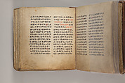 Arganonä Maryam (The Organ of Mary) prayer book, Attributed to Baselyos (The Ground Hornbill Master) (active late 17th century, Lasta region, Ethiopian), Parchment, pigment ink, wood, leather, fiber