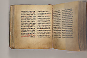 Arganonä Maryam (The Organ of Mary) prayer book, Attributed to Baselyos (The Ground Hornbill Master) (active late 17th century, Lasta region, Ethiopian), Parchment, pigment ink, wood, leather, fiber