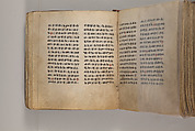 Arganonä Maryam (The Organ of Mary) prayer book, Attributed to Baselyos (The Ground Hornbill Master) (active late 17th century, Lasta region, Ethiopian), Parchment, pigment ink, wood, leather, fiber