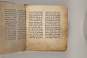 Arganonä Maryam (The Organ of Mary) prayer book, Attributed to Baselyos (The Ground Hornbill Master) (active late 17th century, Lasta region, Ethiopian), Parchment, pigment ink, wood, leather, fiber