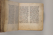 Arganonä Maryam (The Organ of Mary) prayer book, Attributed to Baselyos (The Ground Hornbill Master) (active late 17th century, Lasta region, Ethiopian), Parchment, pigment ink, wood, leather, fiber