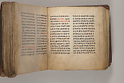 Arganonä Maryam (The Organ of Mary) prayer book, Attributed to Baselyos (The Ground Hornbill Master) (active late 17th century, Lasta region, Ethiopian), Parchment, pigment ink, wood, leather, fiber