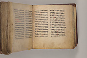 Arganonä Maryam (The Organ of Mary) prayer book, Attributed to Baselyos (The Ground Hornbill Master) (active late 17th century, Lasta region, Ethiopian), Parchment, pigment ink, wood, leather, fiber