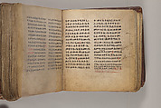 Arganonä Maryam (The Organ of Mary) prayer book, Attributed to Baselyos (The Ground Hornbill Master) (active late 17th century, Lasta region, Ethiopian), Parchment, pigment ink, wood, leather, fiber