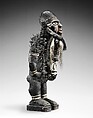 Power Figure (Nkisi N'Kondi: Mangaaka), Wood, iron, resin, cowrie shell, animal hide and hair (tail of colobus monkey?), ceramic, plant fiber, pigment, Kongo peoples, Yombe group