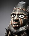 Power Figure (Nkisi N'Kondi: Mangaaka), Wood, iron, resin, cowrie shell, animal hide and hair (tail of colobus monkey?), ceramic, plant fiber, pigment, Kongo peoples, Yombe group
