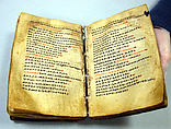 Prayer book with case (mahdar), Wäldä Maryam (African, Amhara or Tigrinya), Parchment (vellum), pigment (red, blue, ochre, and black), leather, wood, string